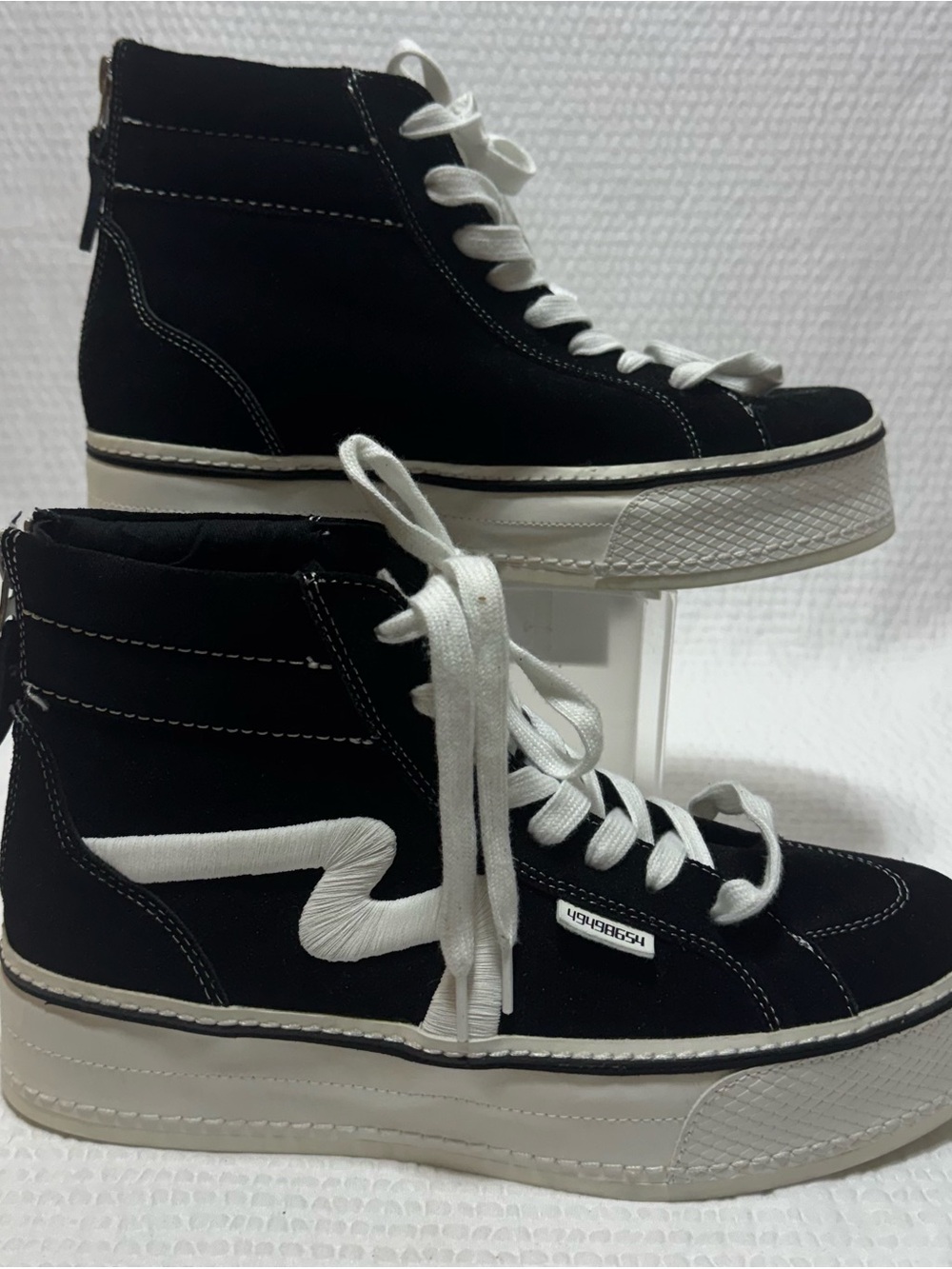 Steve Madden Black and White High-Top Sneakers